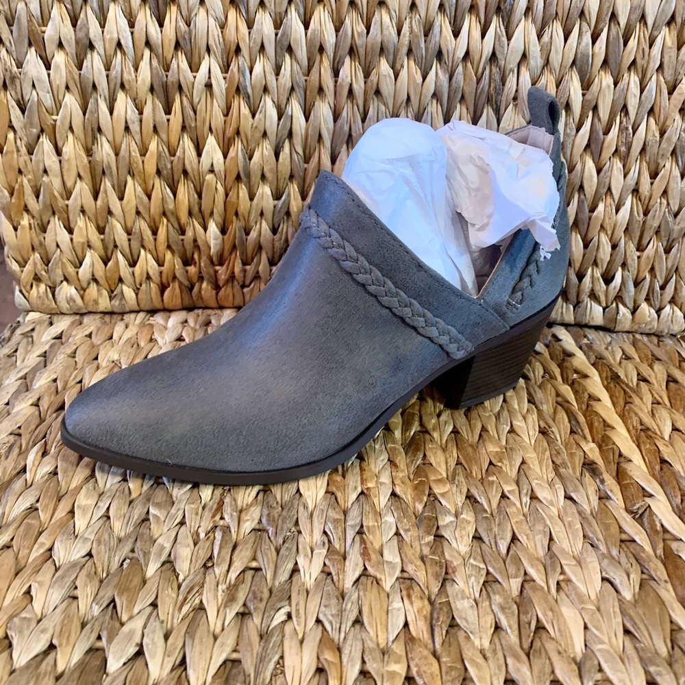 Never worn  bootie with braid detail